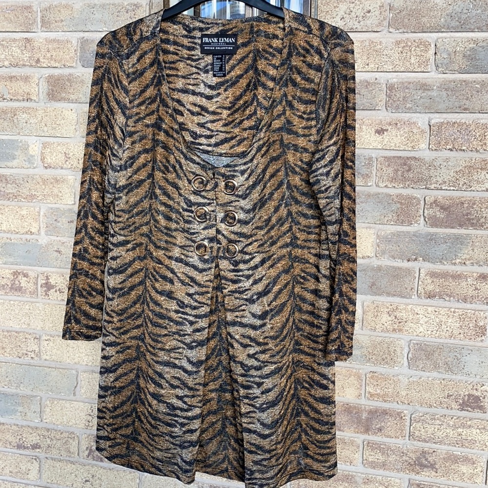 Black and brown zebra print knit sweater. It’s only been worn three times.